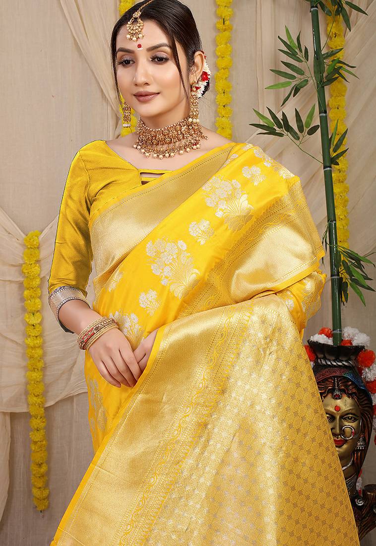 Yellow banarasi silk blend saree with zari floral weaving & rich pallu