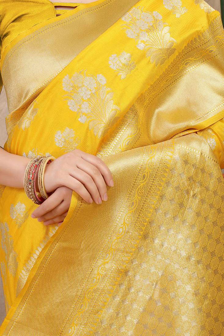 Yellow banarasi silk blend saree with zari floral weaving & rich pallu