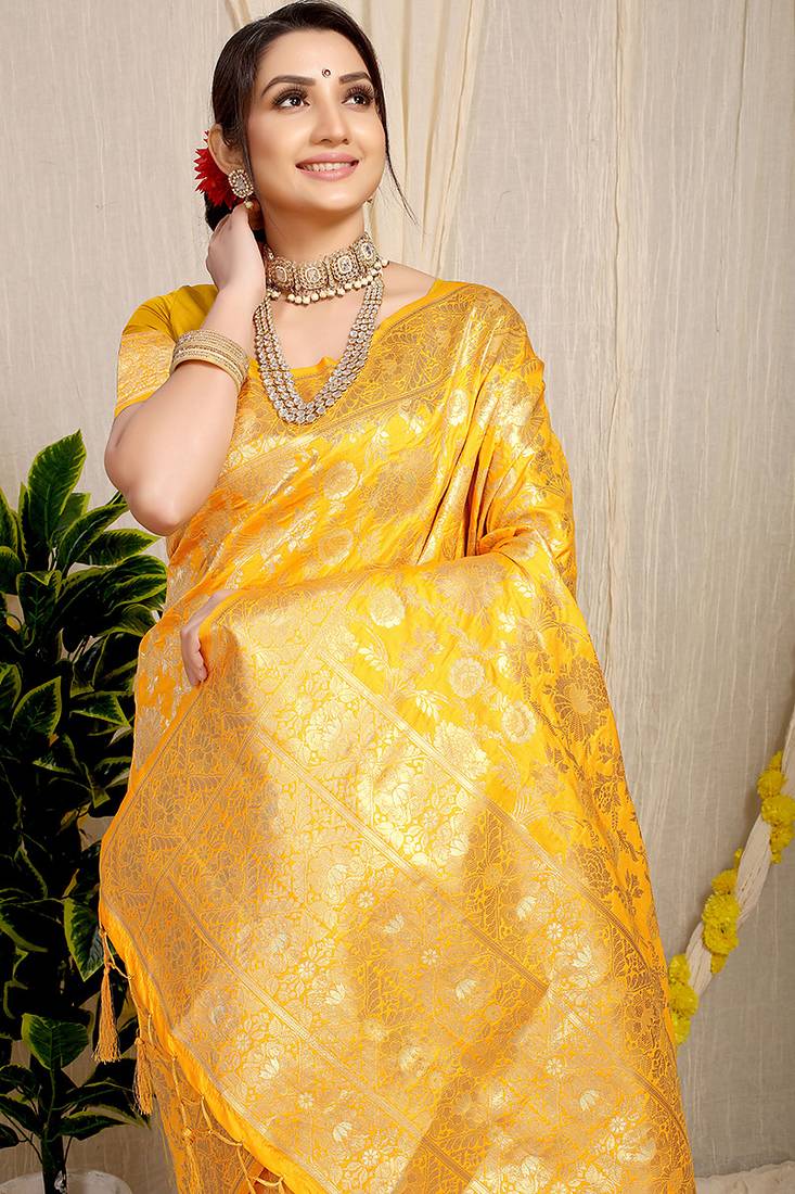Mustard yellow banarasi silk blend saree with rich gold zari floral weaving