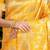 Mustard yellow banarasi silk blend saree with rich gold zari floral weaving