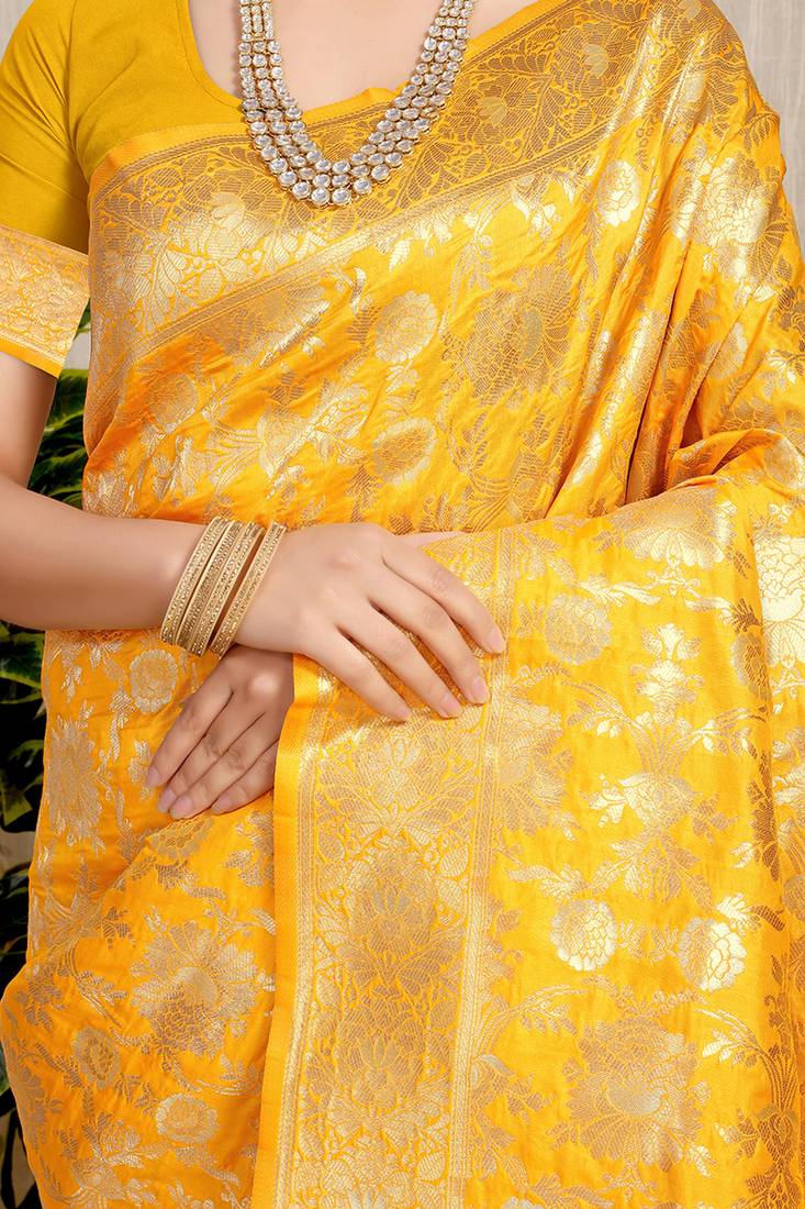 Mustard yellow banarasi silk blend saree with rich gold zari floral weaving