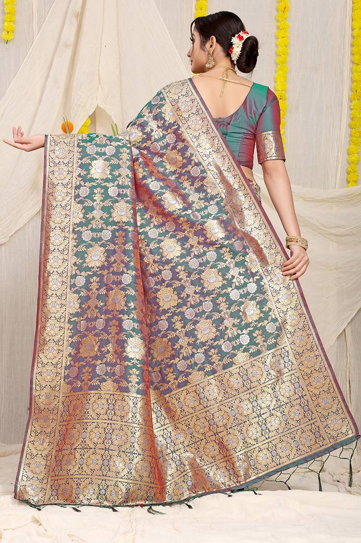 Teal banarasi silk blend saree with rich gold zari floral weaving