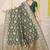Bottle green banarasi silk blend saree with rich gold zari floral weaving