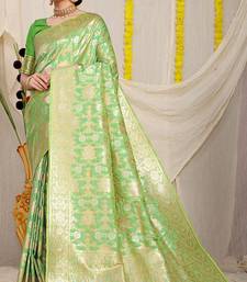 Light green banarasi silk blend saree with rich gold zari floral weaving