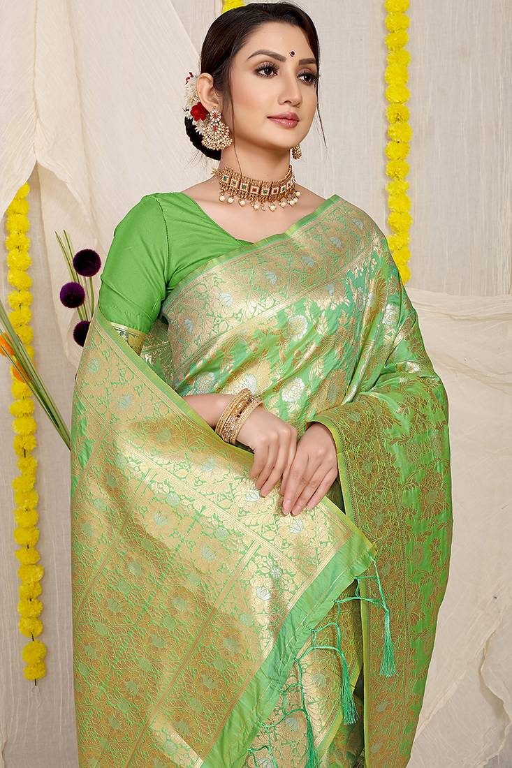 Light green banarasi silk blend saree with rich gold zari floral weaving