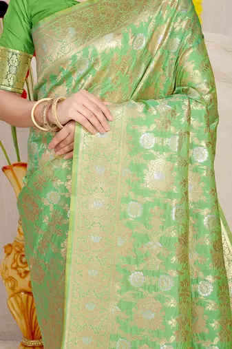 Light green banarasi silk blend saree with rich gold zari floral weaving