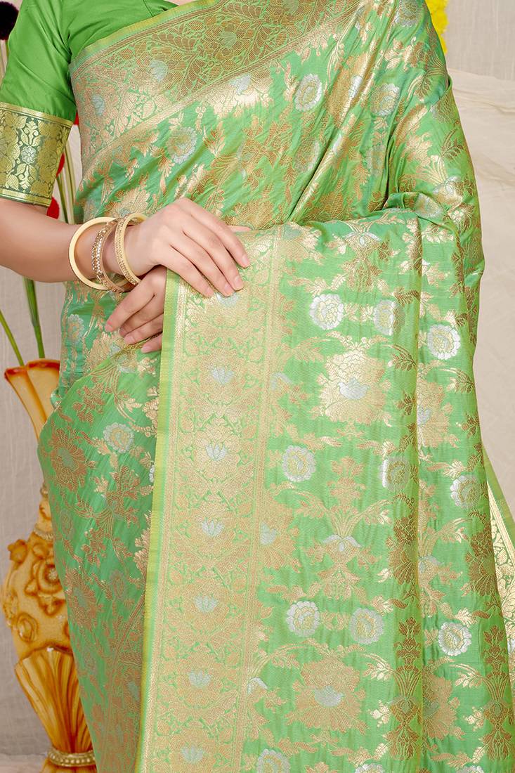 Light green banarasi silk blend saree with rich gold zari floral weaving
