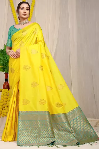 Yellow banarasi silk blend saree with gold leaf buttis & woven border