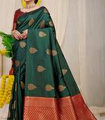 Bottle green banarasi silk blend saree with gold leaf buttis & woven border