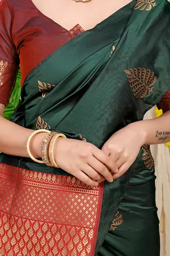 Bottle green banarasi silk blend saree with gold leaf buttis & woven border