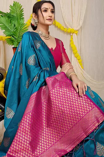 Teal blue banarasi silk blend saree with gold leaf buttis & woven border