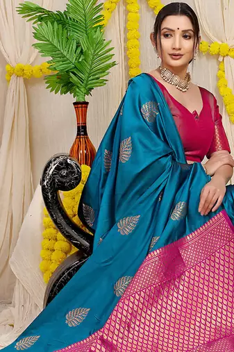 Teal blue banarasi silk blend saree with gold leaf buttis & woven border