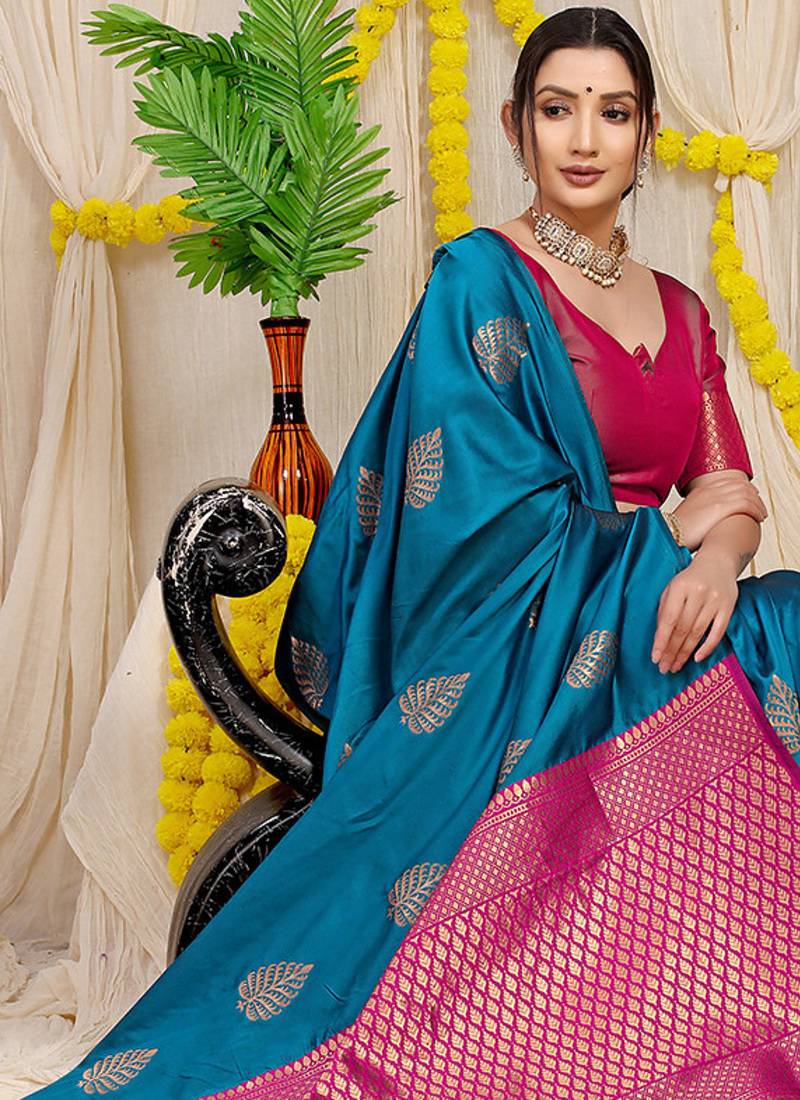 Teal blue banarasi silk blend saree with gold leaf buttis & woven border