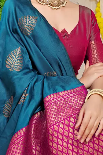 Teal blue banarasi silk blend saree with gold leaf buttis & woven border