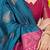 Teal blue banarasi silk blend saree with gold leaf buttis & woven border
