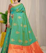 Sea green banarasi silk blend saree with gold leaf buttis & woven border