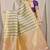 Lime green & purple banarasi silk blend saree with zari woven geometric pattern