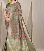 Dark green & maroon banarasi silk blend saree with zari woven geometric pattern
