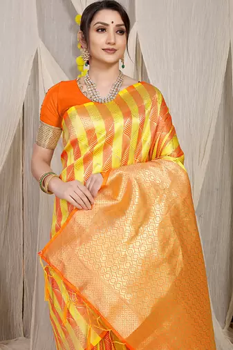 Yellow & orange green banarasi silk blend saree with zari woven geometric pattern