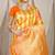Yellow & orange green banarasi silk blend saree with zari woven geometric pattern