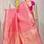 Rani pink & coral orange banarasi silk blend saree with zari woven geometric pattern and gold zari