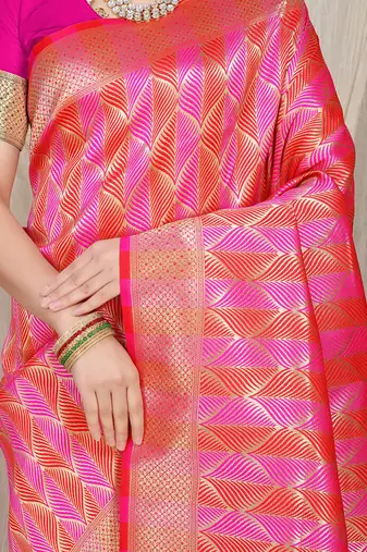 Rani pink & coral orange banarasi silk blend saree with zari woven geometric pattern and gold zari