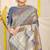 Grey banarasi silk blend saree with bandhani patola print and zari border
