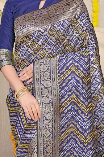 Navy blue banarasi silk blend saree with bandhani patola print and zari border
