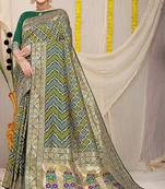 Dark green banarasi silk blend saree with bandhani patola print and zari border