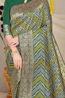 Dark green banarasi silk blend saree with bandhani patola print and zari border 4