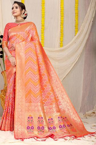 Peach banarasi silk blend saree with bandhani patola print and zari border