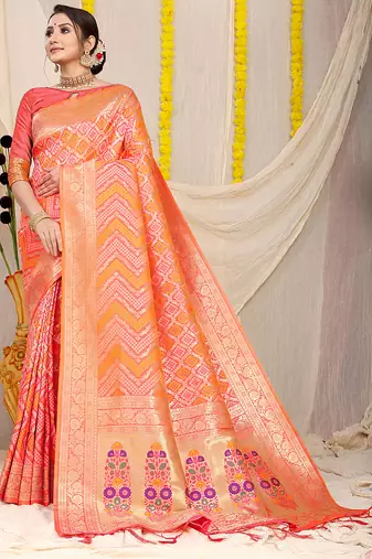 Peach banarasi silk blend saree with bandhani patola print and zari border