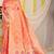 Peach banarasi silk blend saree with bandhani patola print and zari border