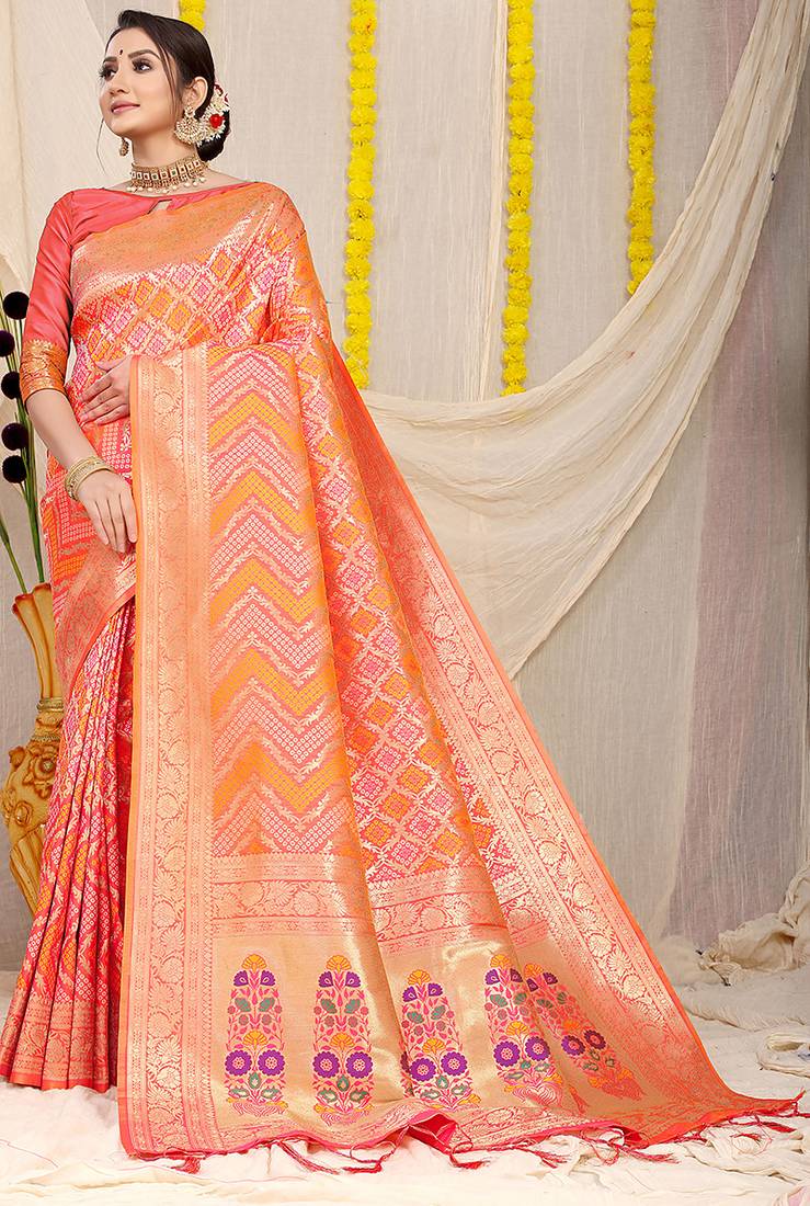 Peach banarasi silk blend saree with bandhani patola print and zari border