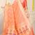 Peach banarasi silk blend saree with bandhani patola print and zari border