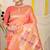 Peach banarasi silk blend saree with bandhani patola print and zari border