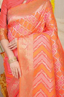 Peach banarasi silk blend saree with bandhani patola print and zari border 4