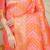 Peach banarasi silk blend saree with bandhani patola print and zari border