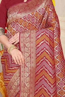 Maroon banarasi silk blend saree with bandhani patola print and zari border 4