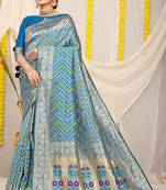 Aqua blue banarasi silk blend saree with bandhani patola print and zari border