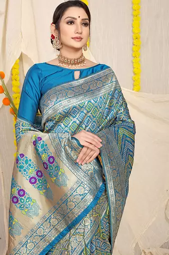 Aqua blue banarasi silk blend saree with bandhani patola print and zari border