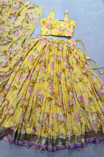 yellow printed chiffon ethnic lehenga choli with dupatta