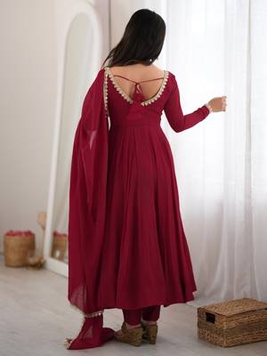 Women's maroon heavy mal chanderi anarkali kurta set with mirror handwork lace dupatta for festive wear 2