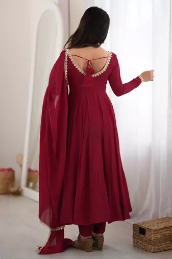 Women's maroon heavy mal chanderi anarkali kurta set with mirror handwork lace dupatta for festive wear