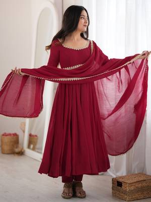 Women's maroon heavy mal chanderi anarkali kurta set with mirror handwork lace dupatta for festive wear 3