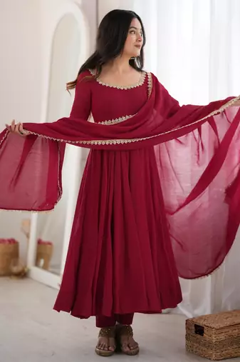 Women's maroon heavy mal chanderi anarkali kurta set with mirror handwork lace dupatta for festive wear