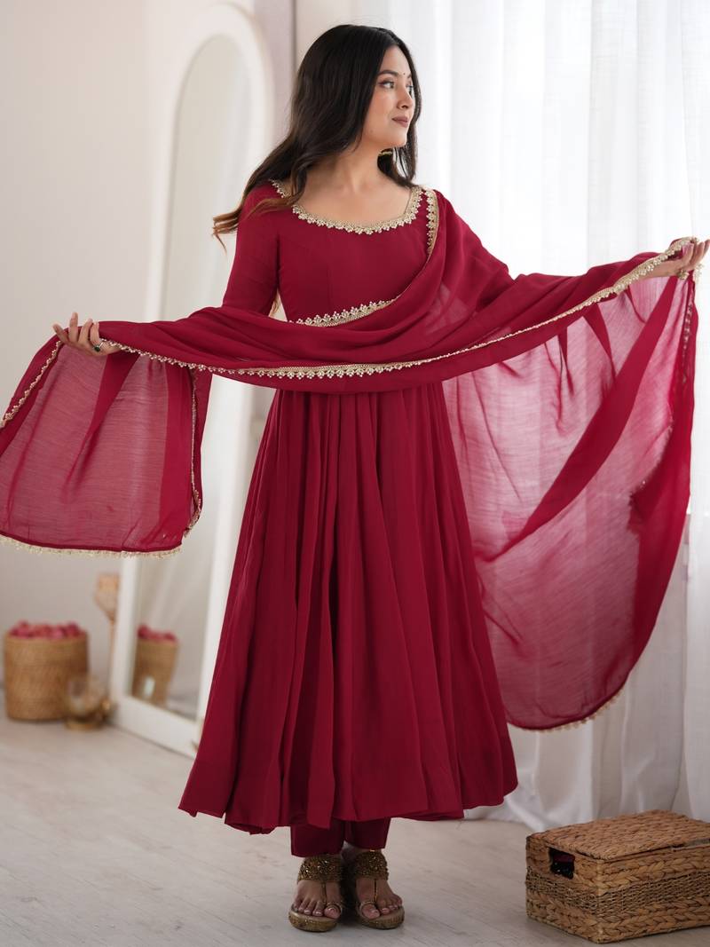 Women's maroon heavy mal chanderi anarkali kurta set with mirror handwork lace dupatta for festive wear