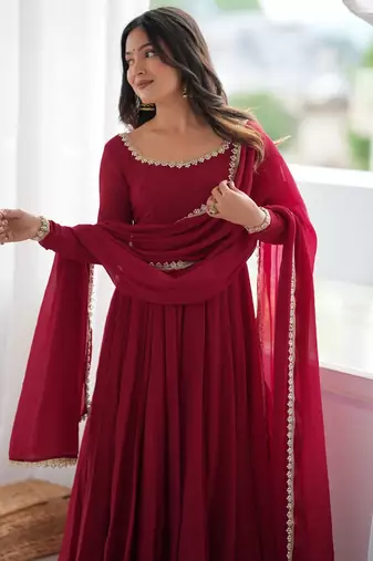Women's maroon heavy mal chanderi anarkali kurta set with mirror handwork lace dupatta for festive wear