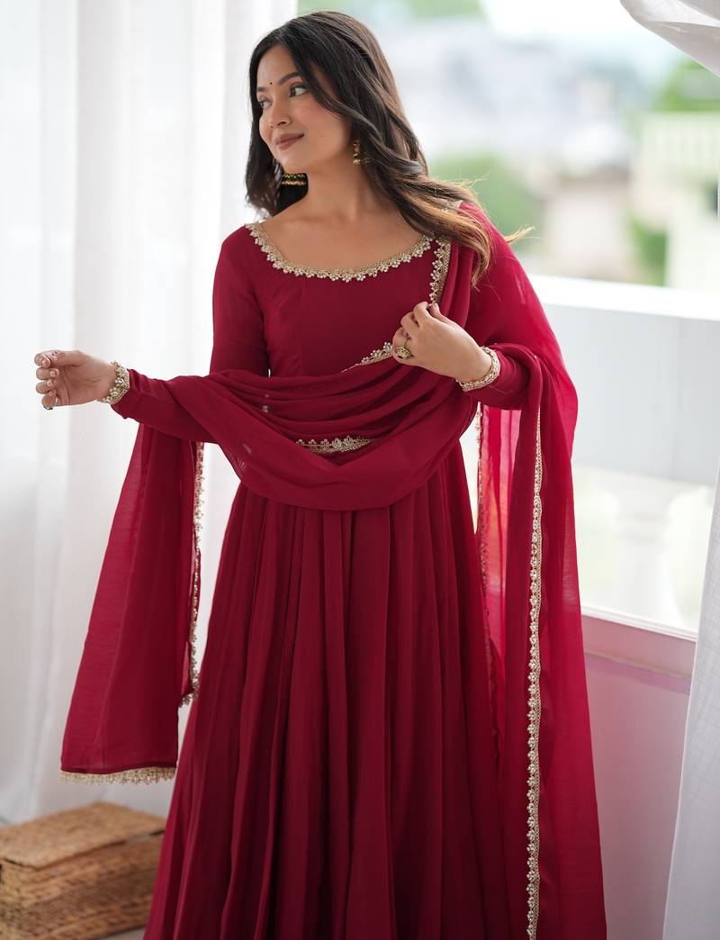 Women's maroon heavy mal chanderi anarkali kurta set with mirror handwork lace dupatta for festive wear
