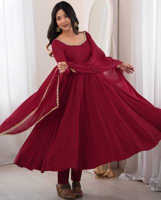 Women's maroon heavy mal chanderi anarkali kurta set with mirror handwork lace dupatta for festive wear 5